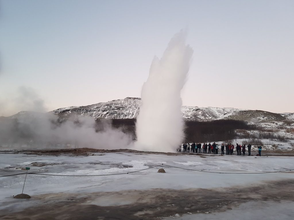 A bloom of water vapour erupts into the air.