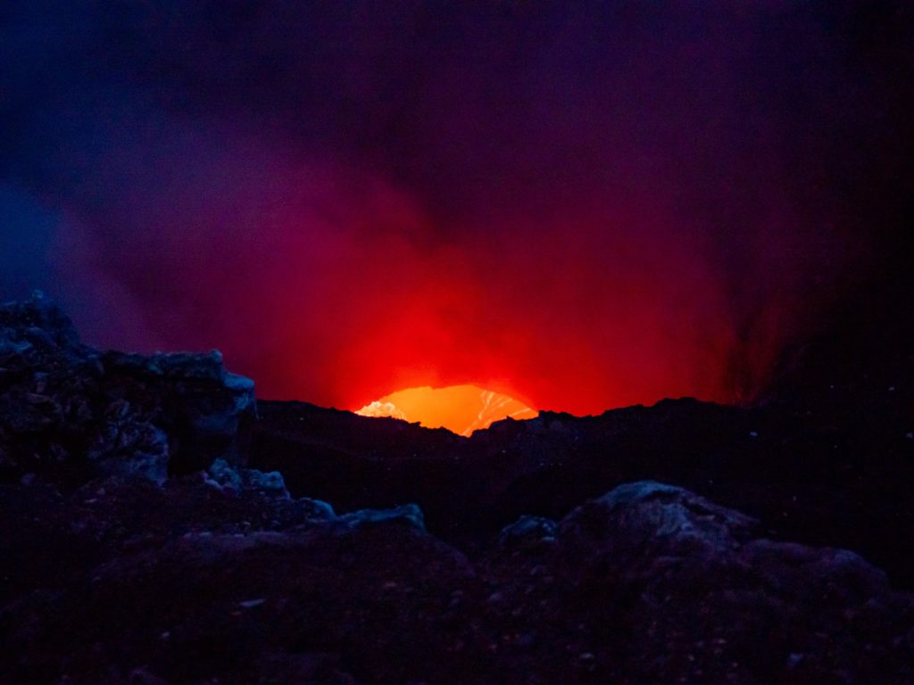 Masaya Volcano National Park has one of the only visible lava pits in the world. The colours are a bright orange red.