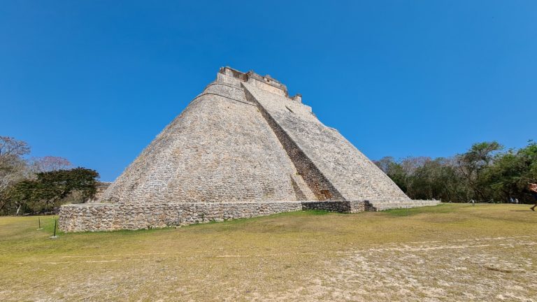 A view of the Pyramid of the Magician showing the tall staircase of narrow stairs.