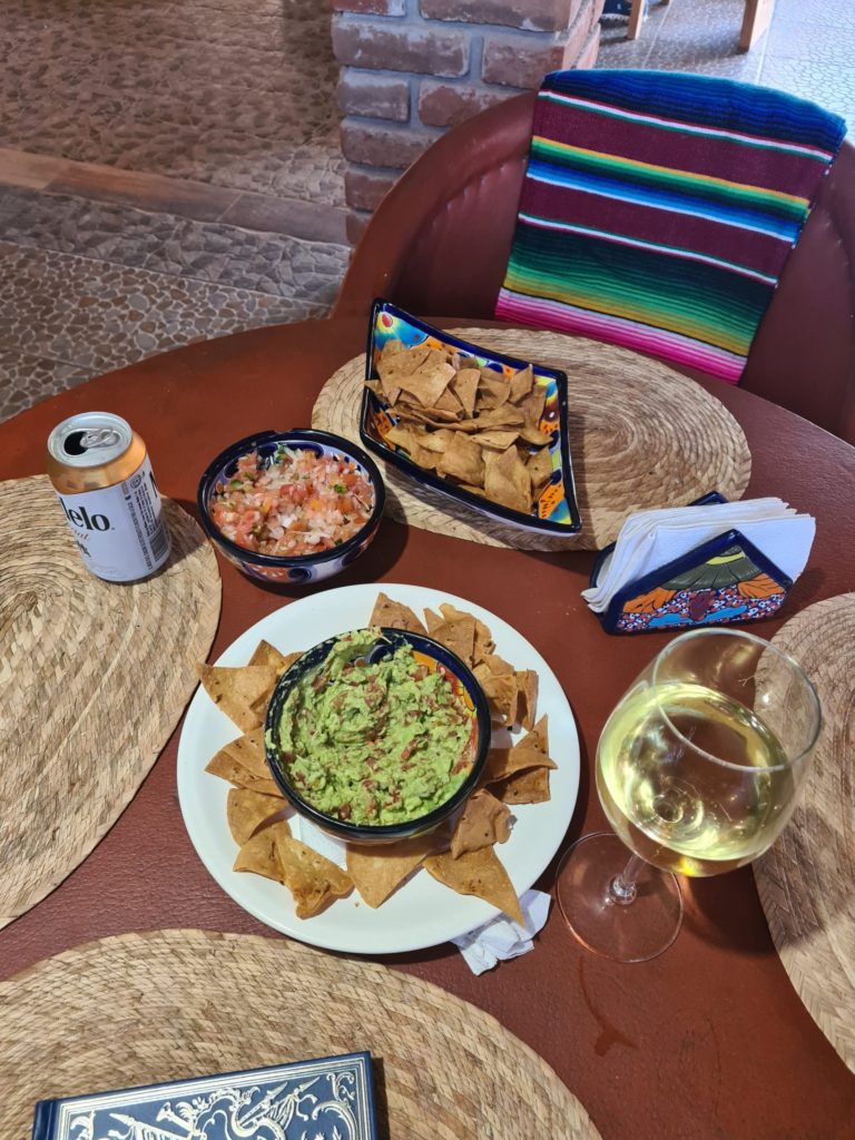 Totopos (tortilla chips), guacamole and pico de gallo are a must try in any Mexican town.