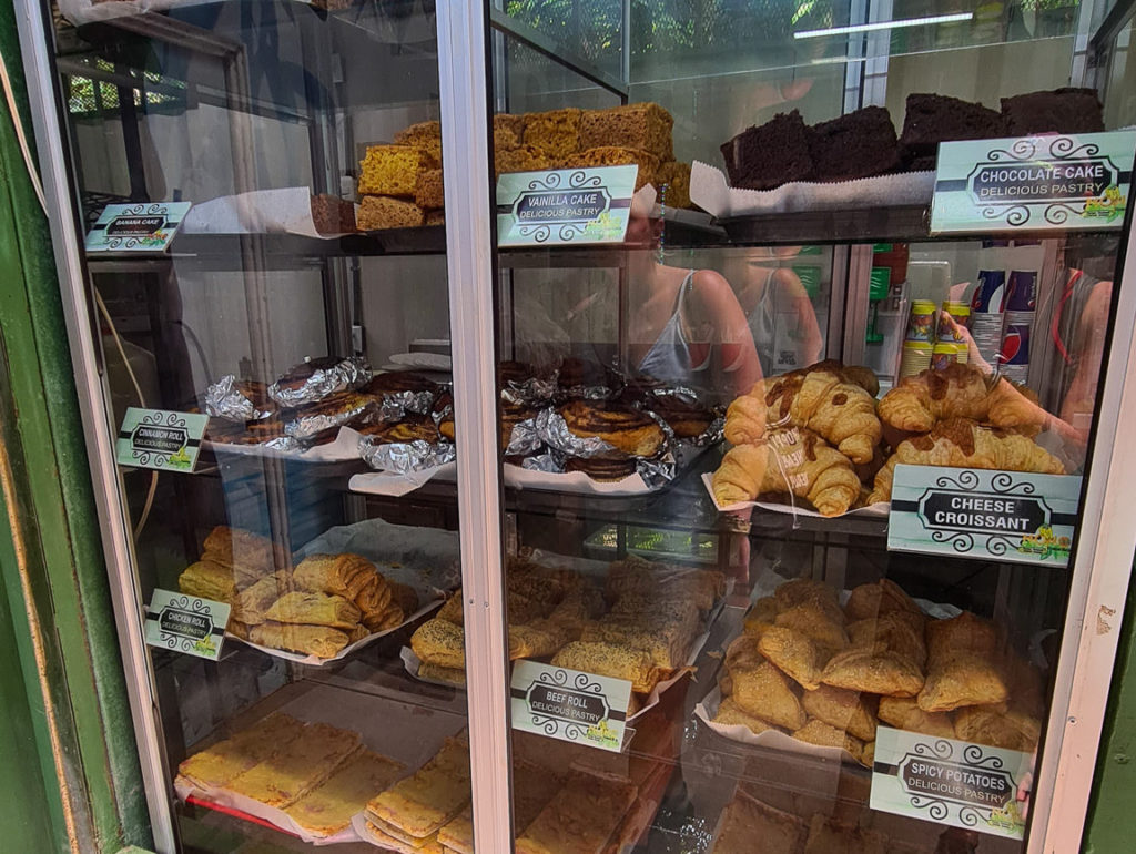 Pastries are stacked up behind a screen at the Manuel Antonio National Park Cafe.