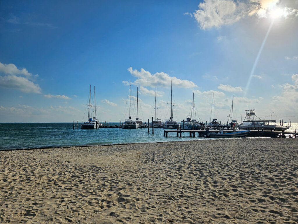 Boats docked in the sunshine in Cancun, Mexico.